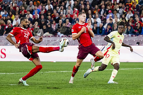 2024–25 UEFA Nations League, Switzerland vs Spain: Switzerland's Gregory Wuthrich, left, Becir Omeragic, center, and Spain's midfielder Nico Williams, right, in action
